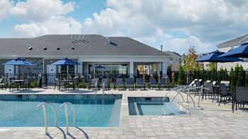 Outdoor heated pool with tanning ledge and spa